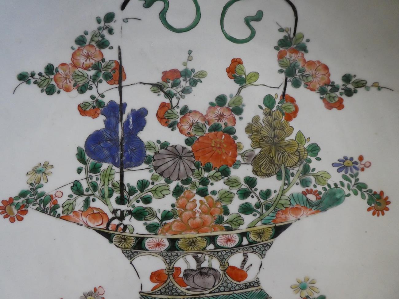 A Chinese Porcelain Dish, Kangxi, painted in famille verte enamels with a basket of flowers within a - Image 4 of 10