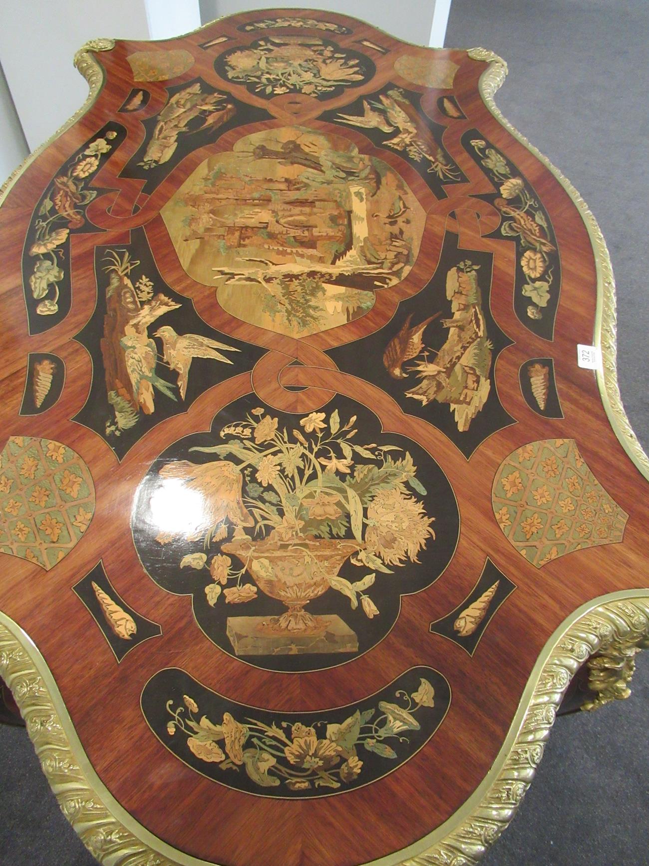 An Impressive Louis XV Style Marquetry Decorated and Ormolu Mounted Centre Table, the shaped top - Image 3 of 6