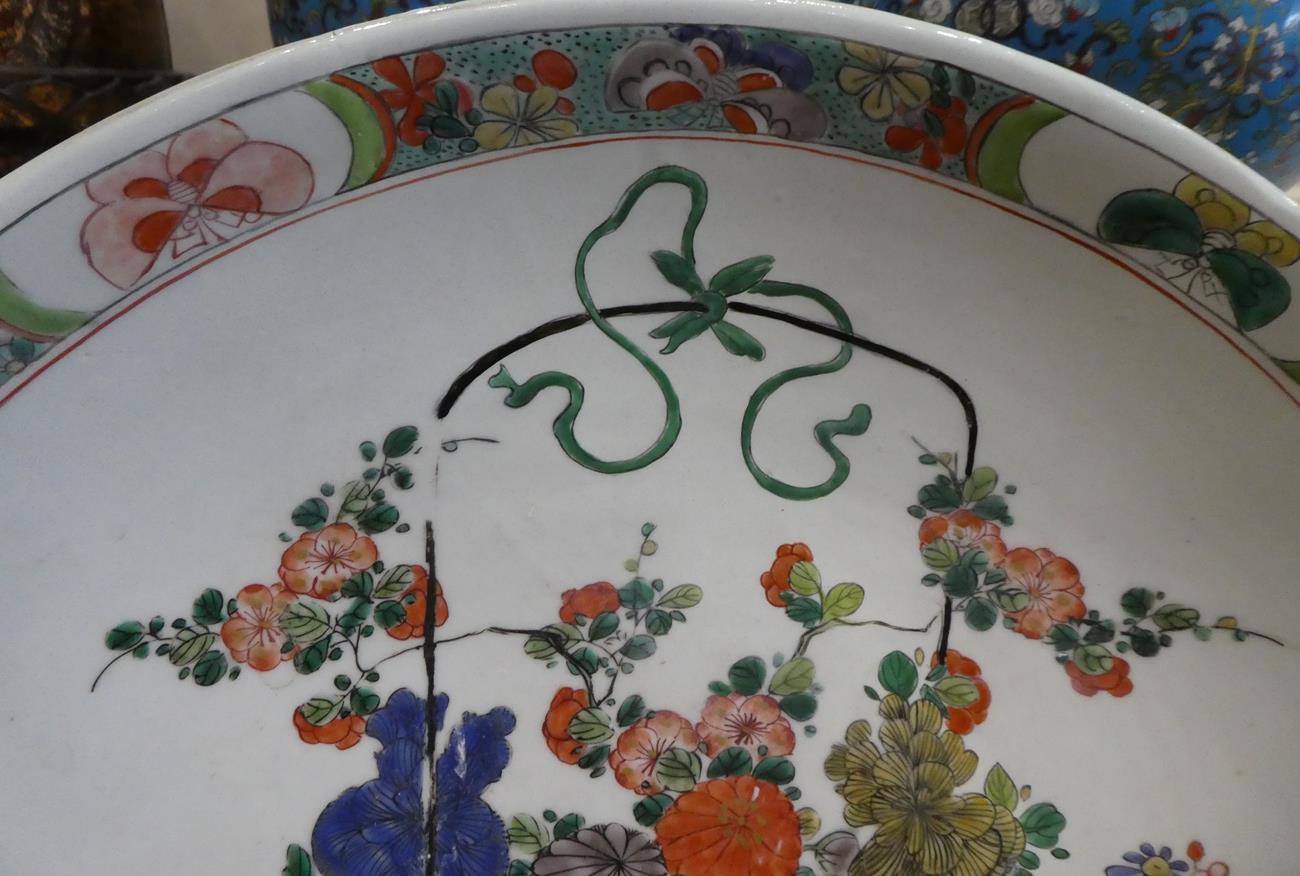 A Chinese Porcelain Dish, Kangxi, painted in famille verte enamels with a basket of flowers within a - Image 3 of 10
