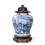 A Chinese Porcelain Jar, Kangxi, of baluster form, painted in underglaze blue with dignitaries and