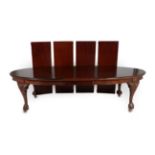 A Late Victorian Mahogany Oval Extending Dining Table, late 19th century, with Joseph Fitter of