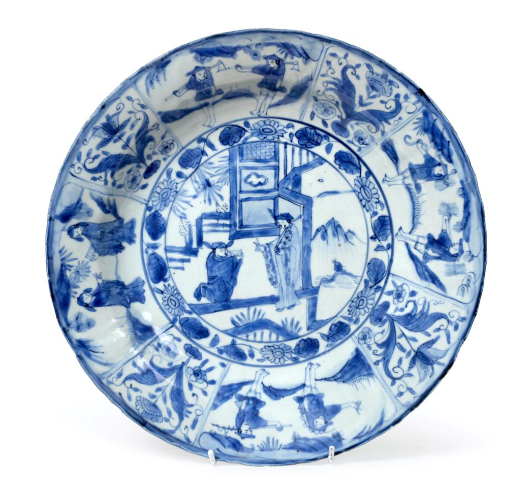 A Chinese Kraak Porcelain Charger, 17th century, painted in underglaze blue with figures in a garden