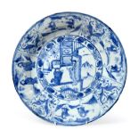 A Chinese Kraak Porcelain Charger, 17th century, painted in underglaze blue with figures in a garden