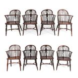 A Matched Set of Eight Yew Windsor Armchairs, mid 19th century, with double spindle back supports