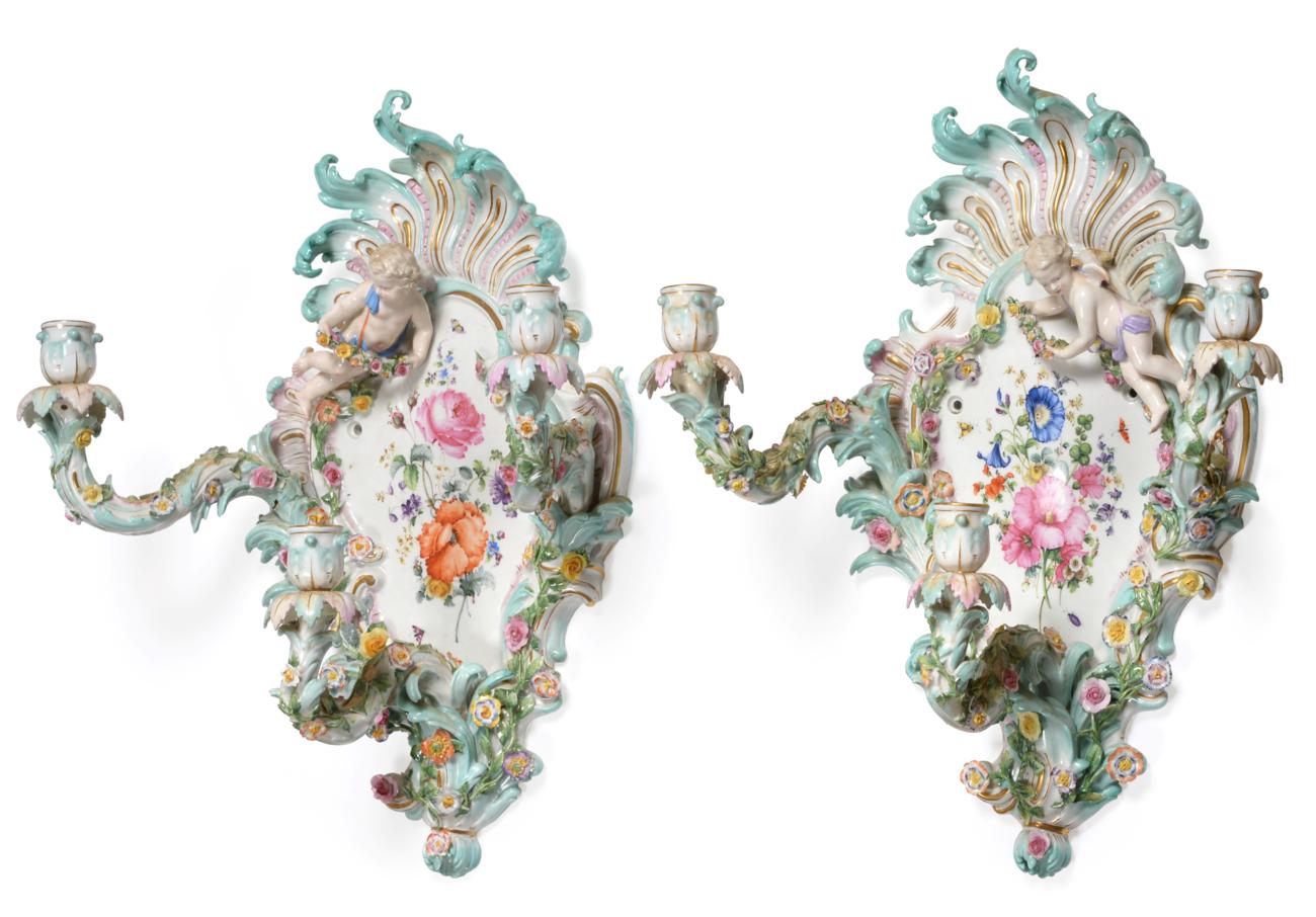 A Pair of Meissen Porcelain Three-Branch Wall Sconces, circa 1900, of flower moulded and encrusted