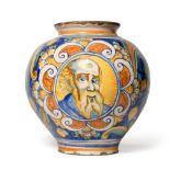 A Caltageroni Majolica Drug Jar, 17th century, of ovoid form, painted with a bust portrait of