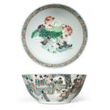 A Chinese Porcelain Punch Bowl, 19th century, painted in famille verte enamels with figures in