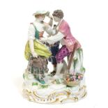 A Meissen Porcelain Figure Group, late 19th/early 20th century, modelled as a gardener and