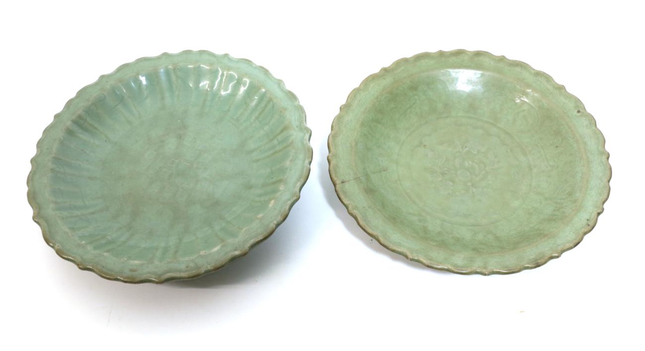 A Longquan Celadon Dish, Ming dynasty, carved with lattice and scrolls within an Arabesque border,