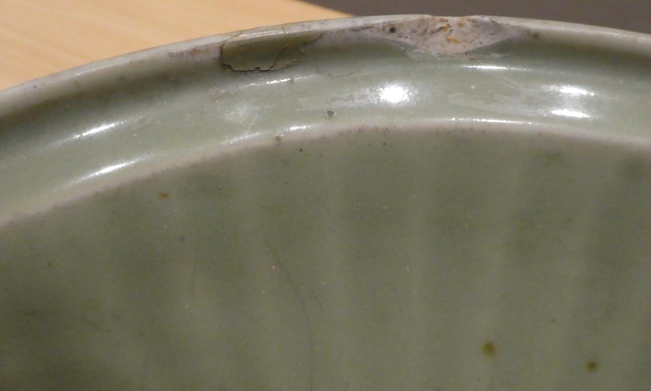 A Longquan Celadon Dish, Ming dynasty, carved with a central foliate panel within a broad fluted - Image 5 of 11