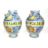 A Pair of Italian Maiolica Wet Drug Jars, 17th century, of ovoid form, inscribed in manganese SYR