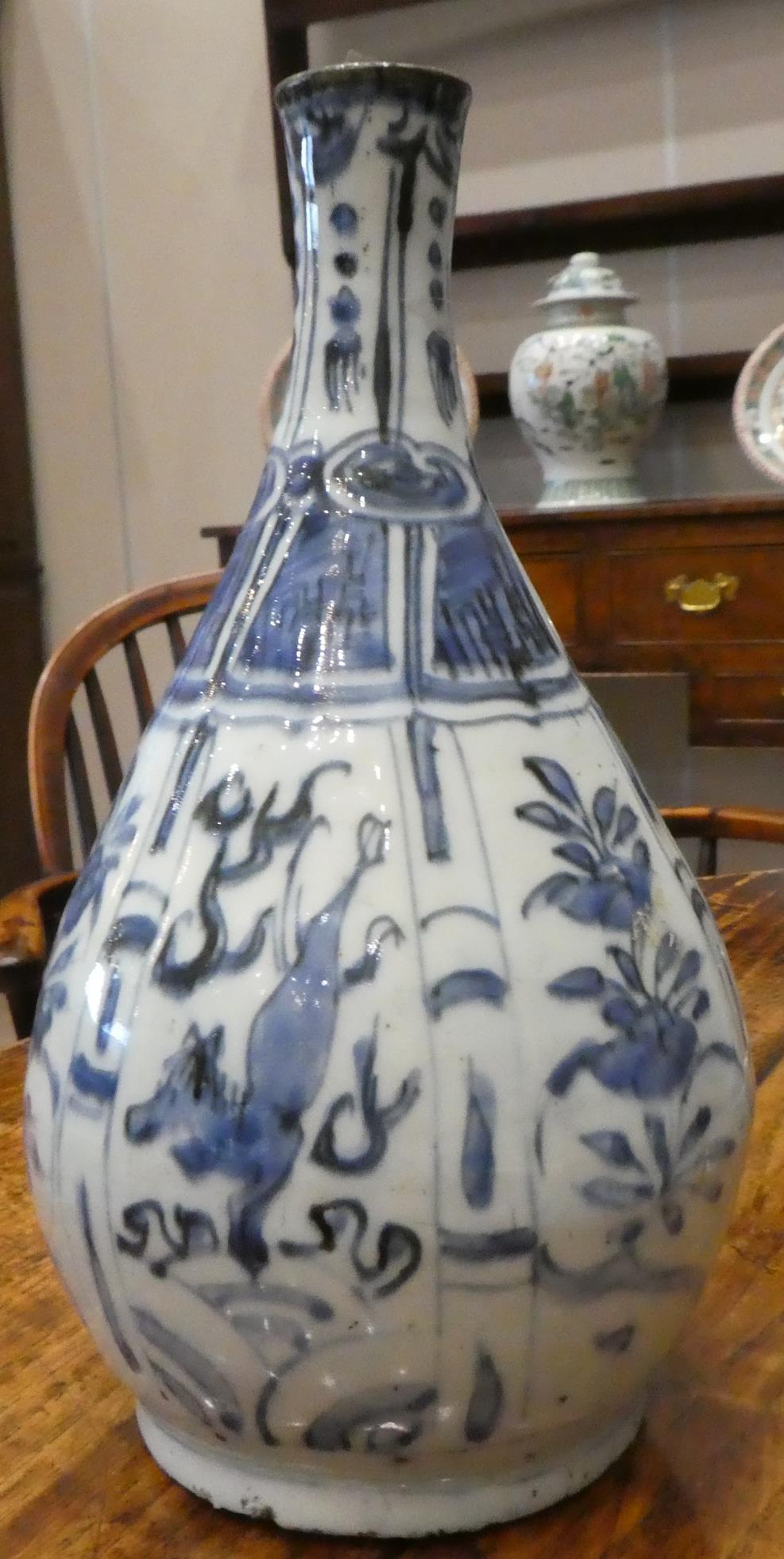 A Chinese Kraak Porcelain Bottle, early 17th century, of pear shape, painted in underglaze blue with - Image 3 of 6