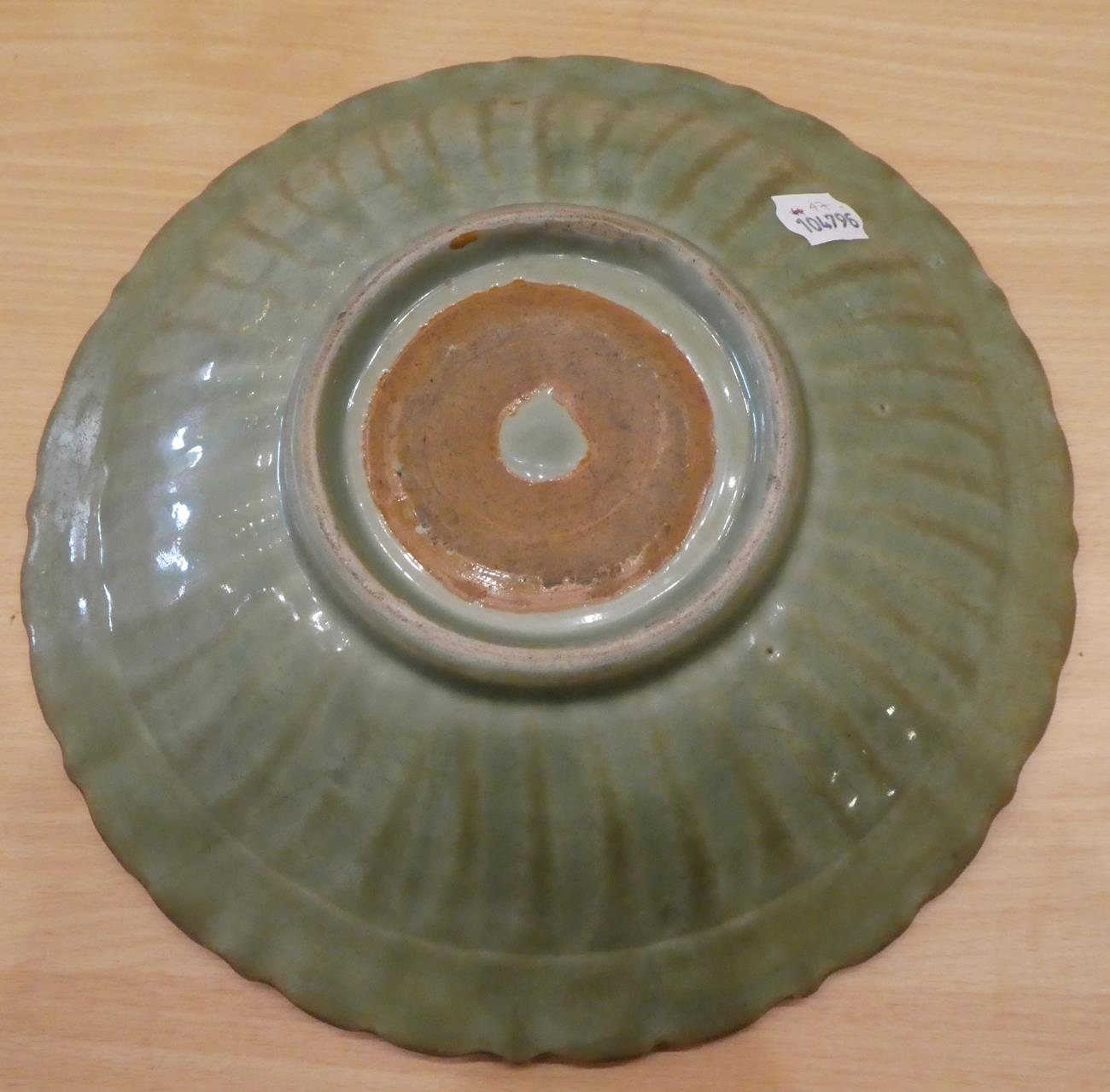 A Longquan Celadon Dish, Ming dynasty, carved with lattice and scrolls within an Arabesque border, - Image 8 of 15