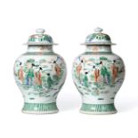 A Pair of Chinese Porcelain Jars and Covers, Kangxi reign mark but late 19th century, of baluster