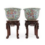 A Pair of Cantonese Porcelain Jardinieres, 19th century, typically painted in famille rose enamels