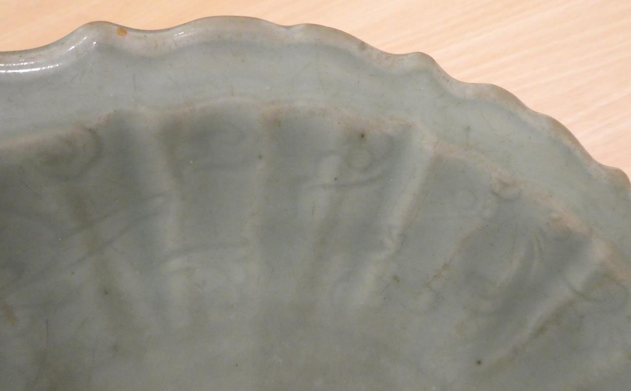 A Longquan Celadon Dish, Ming dynasty, carved with lattice and scrolls within an Arabesque border, - Image 11 of 15