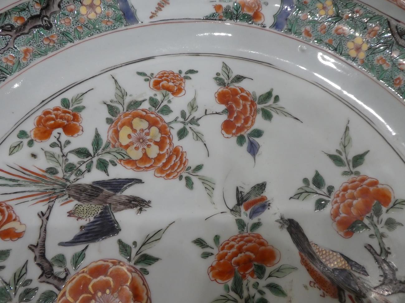 A Chinese Porcelain Charger, Kangxi, painted in famille verte enamels with a birds amongst flowering - Image 7 of 7