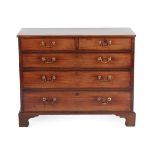 A George III Mahogany Straight Front Chest of Drawers, late 18th century, the crossbanded top