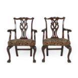 A Pair of George III Mahogany Carver Chairs, late 18th century, the carved top rail with acanthus