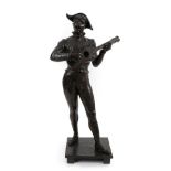 After Jean Didier Début (1824-1893): A Bronze Figure of Harlequin, standing playing the guitar, on a