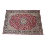 Tabriz Carpet North West Iran, circa 1960 The blood red field of vines and palmettes around an