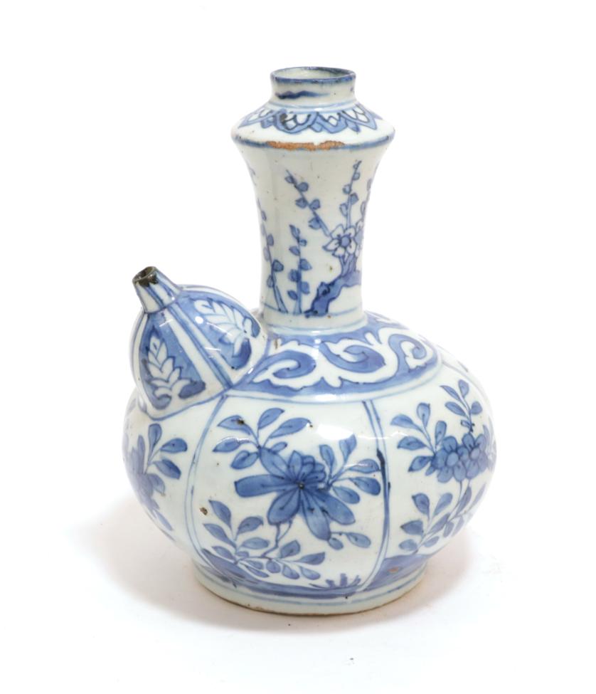 A Chinese Kraak Porcelain Kendi, early 17th century, of traditional form, painted in underglaze blue