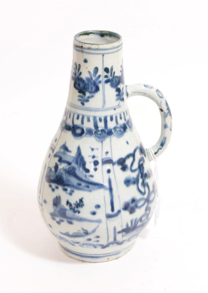 A Kraak Porcelain Ewer, early 17th century, of pear shape with loop handle, typically painted in