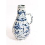 A Kraak Porcelain Ewer, early 17th century, of pear shape with loop handle, typically painted in