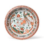 A Chinese Porcelain Plate, Kangxi, painted in famille verte enamels with a phoenix amongst foliage