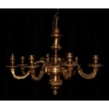 A Gilt Metal Eight-Light Chandelier, in Louis XIV style, with baluster column and leaf sheathed