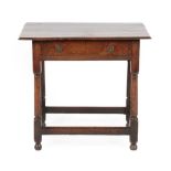 An Early 18th Century Oak Side Table, the moulded top above a single frieze drawer, on turned legs