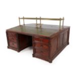 An Early Victorian Mahogany Double-Sided Counting-House Desk, mid 19th century, the middle section