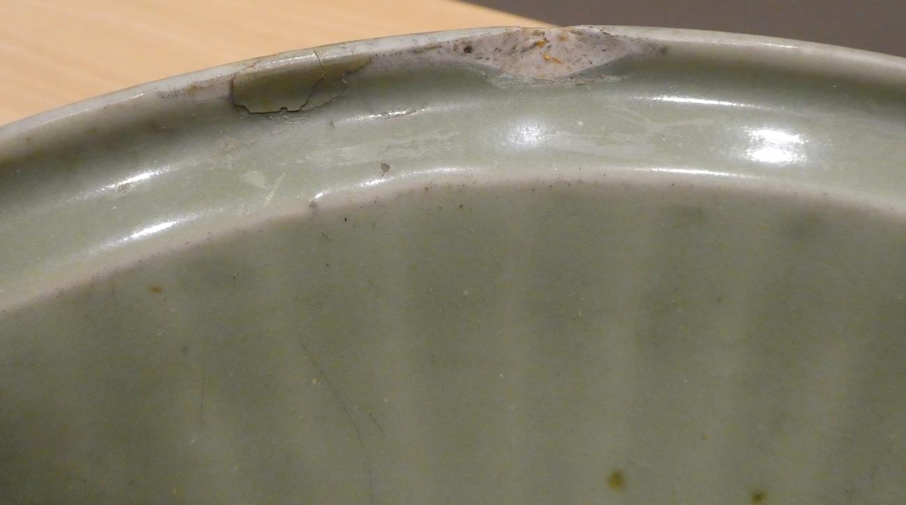 A Longquan Celadon Dish, Ming dynasty, carved with a central foliate panel within a broad fluted - Image 6 of 11