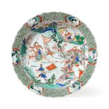 A Chinese Porcelain Dish, Kangxi, painted in famille verte enamels with a battle scene within a