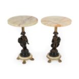 A Pair of Green Onyx and Bronze Occasional Tables, the circular tops above reeded brass columns