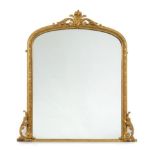 A Victorian Gilt and Gesso Overmantel Mirror, circa 1870, the original mirror plate within a stiff