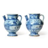 A Pair of Savona Maiolica Wet Drug Jars, 17th century, inscribed in blue on a landscape ground, 28cm