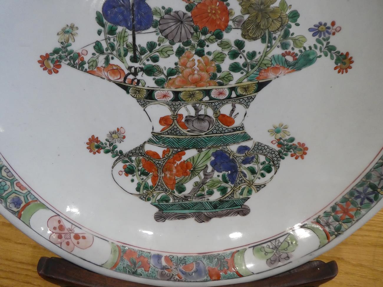 A Chinese Porcelain Dish, Kangxi, painted in famille verte enamels with a basket of flowers within a - Image 5 of 10