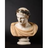 After the Antique: A Carved White and Coloured Marble Bust of Augustus, with applied bronze laurel