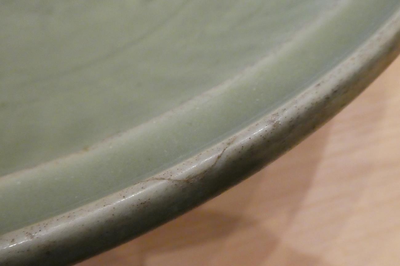 A Longquan Celadon Dish, Ming dynasty, carved with a central foliate panel within a broad fluted - Image 8 of 11