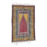 Ezurum Prayer Kilim Circa 1920 The deep aubergine field beneath a steep Mihrab framed by pistachio