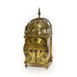 An 18th Century Style Brass Lantern Clock, pierced frets, four posted frame case, engraved side