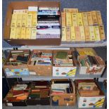 Eleven boxes of books including Wiston Cricketer's Almanack, Ladybird books, Asterix hard back