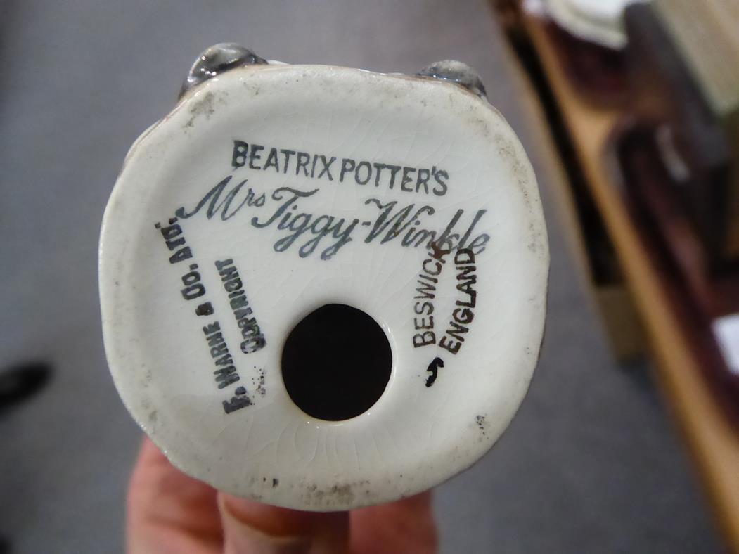 A group of Beatrix Potter books, five Beswick Beatrix Potter models, three Halcyon Days enamel boxes - Image 4 of 11