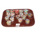 A collection of seventeen Halcyon Days enamel Christmas trinket boxes, from 1990 to 2006 (no boxes)