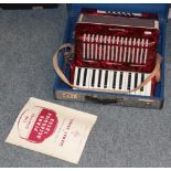 A cased Galotta piano accordion