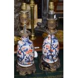 A pair of Japanese Imari porcelain table lamps