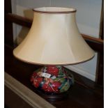 A modern Moorcroft Simeon pattern lamp with original shade