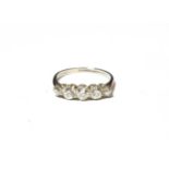 A diamond five stone ring, stamped 'PLAT', finger size N. Gross weight 3.0 grams.