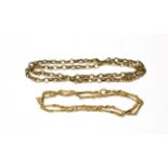A fancy link chain, stamped '375', length 49cm; and a trace link chain, unmarked, length 60cm .